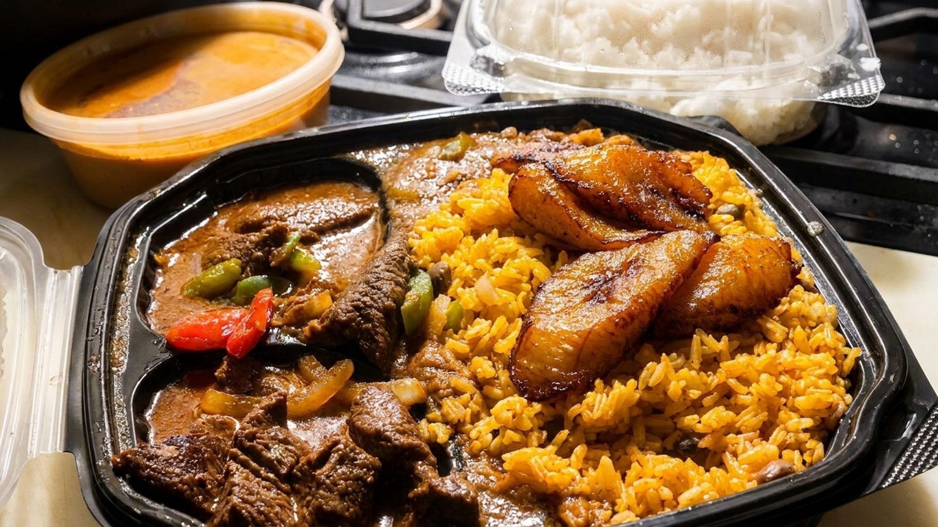 Pizza plus plantains and stew chicken