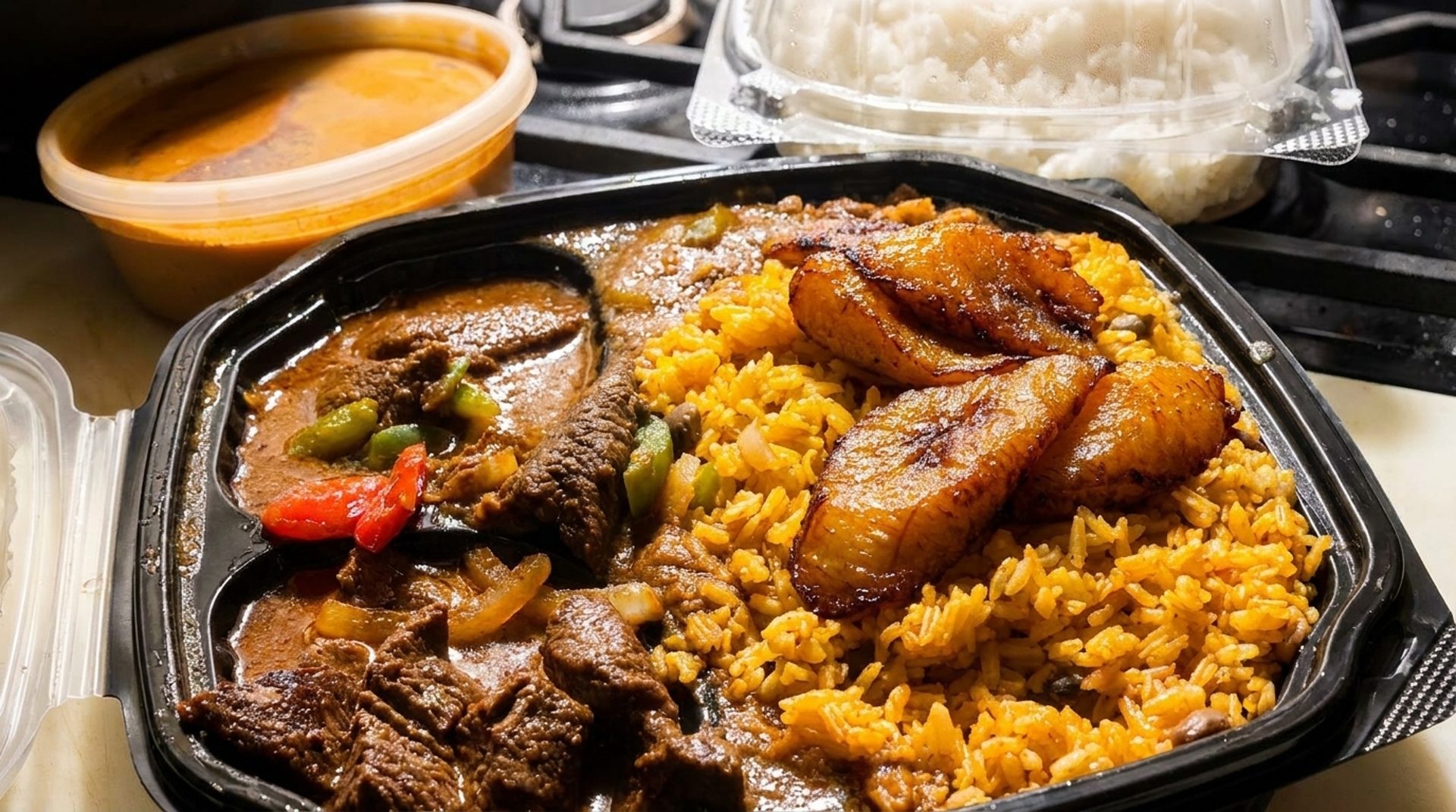 Pizza plus plantains and stew chicken